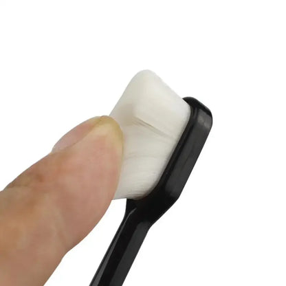 Ultra fine toothbrush with soft bristles