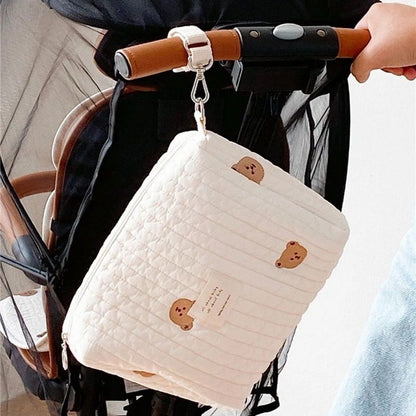 Wickeltasche aus bestickter und gesteppter Baumwolle 